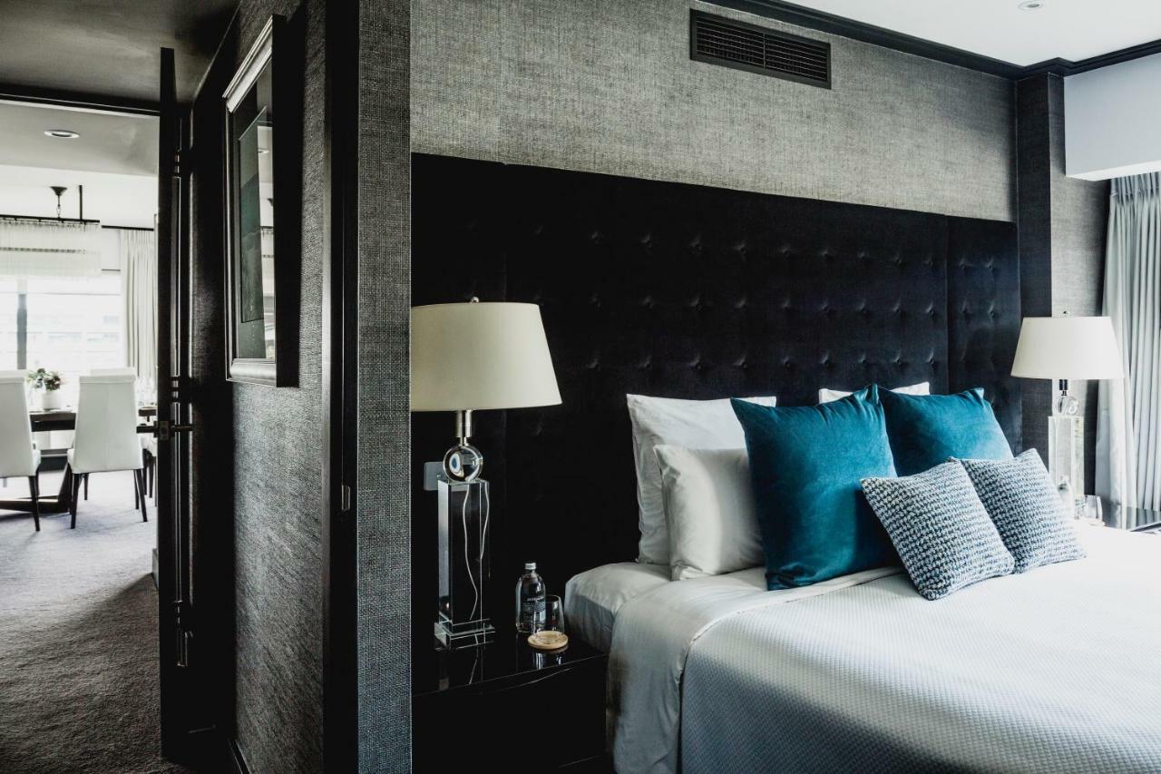 Bolton Hotel Wellington Bagian luar foto A bedroom at the hotel